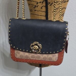 Coach Black and Tan Crossbody Bag with Gold Accents - Used In A Good Condition